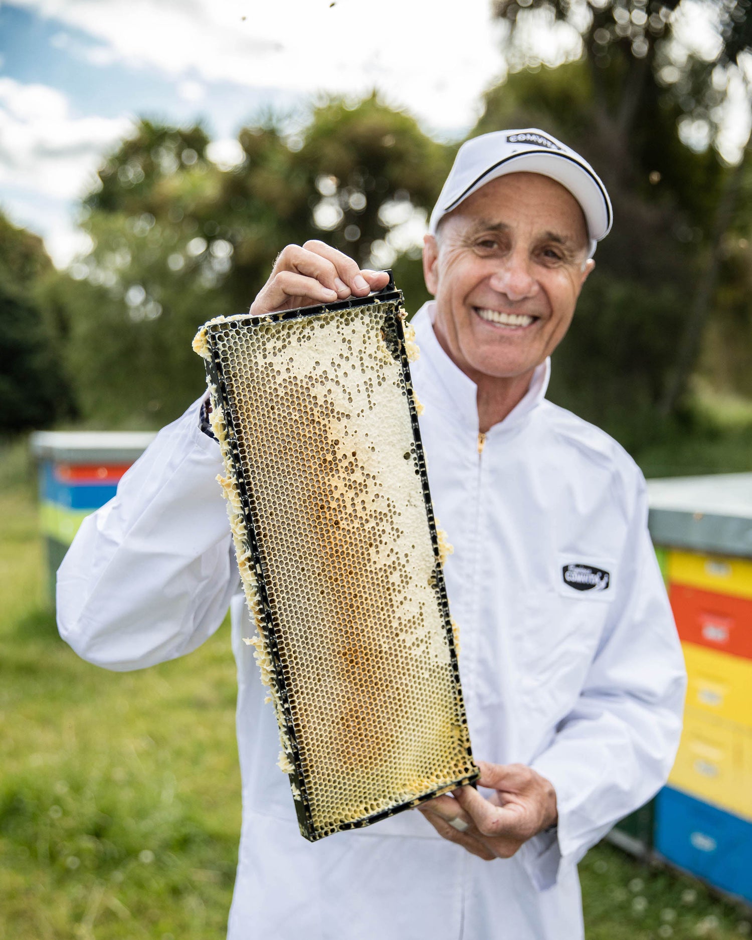 Alan with hive frame full of honey